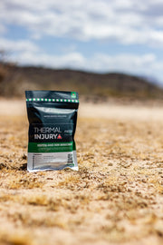THERMAL INJURY FIELD KIT in a desert background with cinematic blurring of distant hills.
