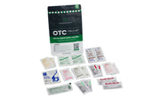 OTC field kit with various medical packets on a white background