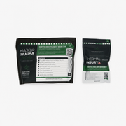 The TRAUMA RESPONSE FIELD PACK.  Wound care pouches on a light gray background: a larger black and green 'Major Trauma' pouch on the left and a smaller black and green 'Thermal Injury Field Pack' pouch on the right.